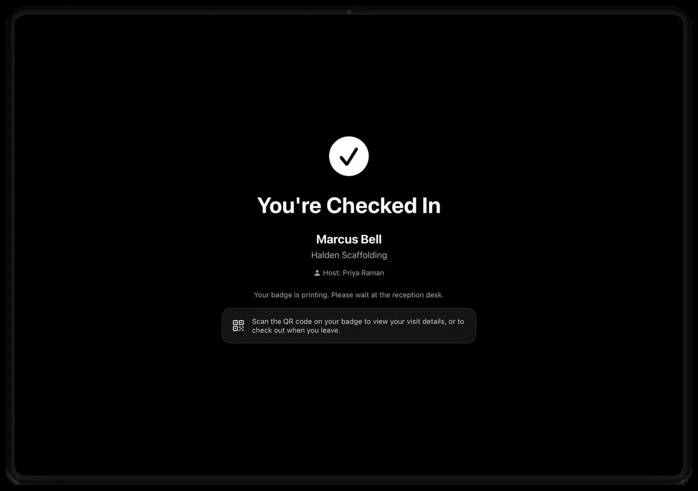 Kiosk confirmation screen: visitor checked in, badge printing, QR code note for checkout